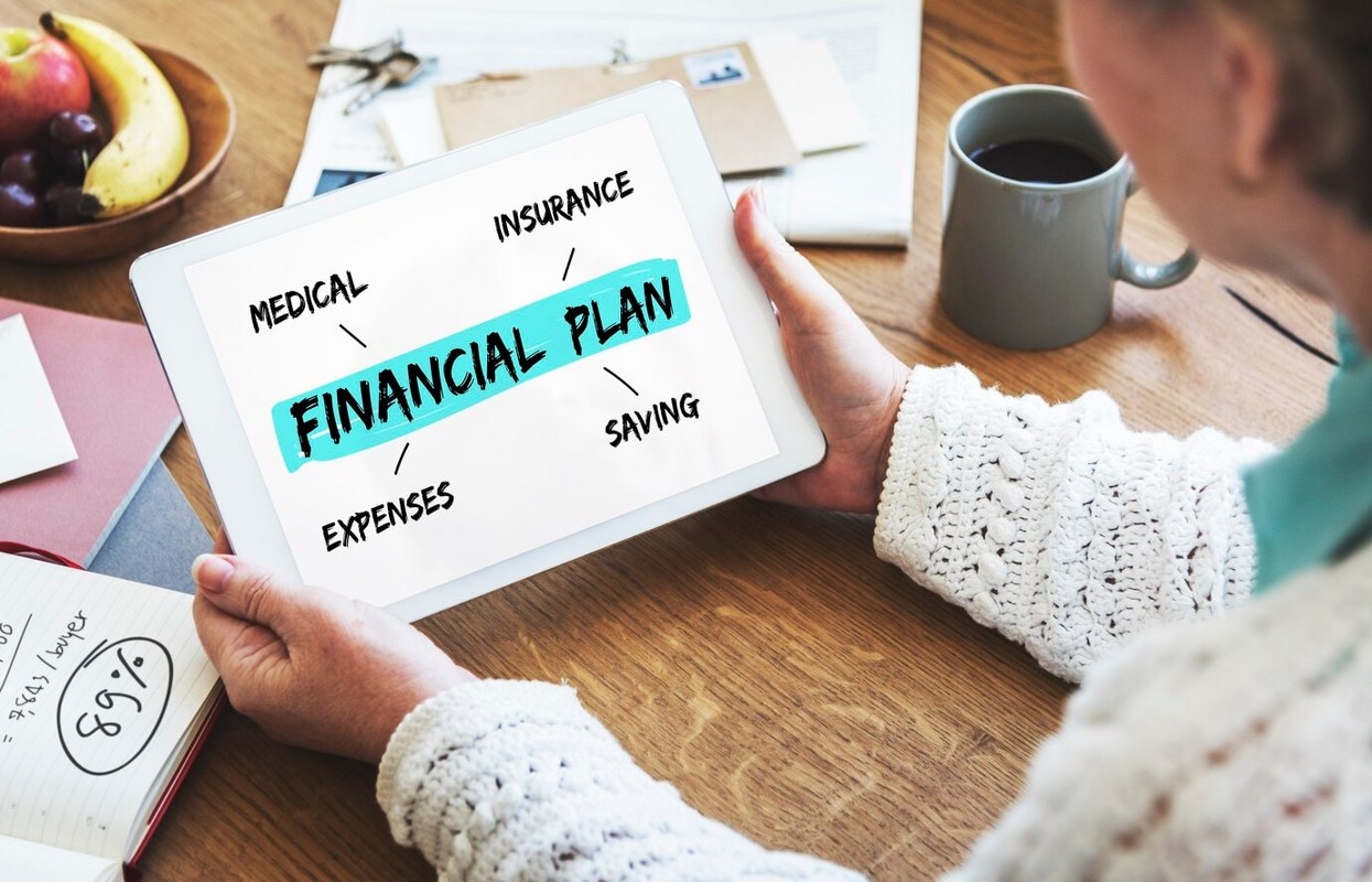 Woman with financial plan diagram concept.