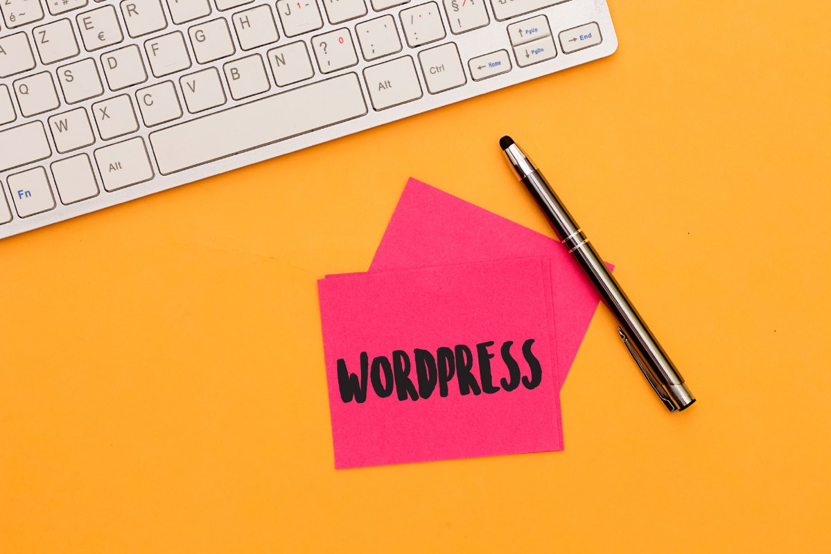 Writing note showing WordPress.