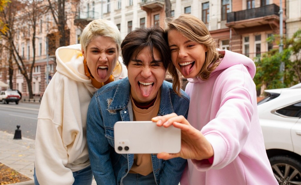A group of friends making a Tiktok video.