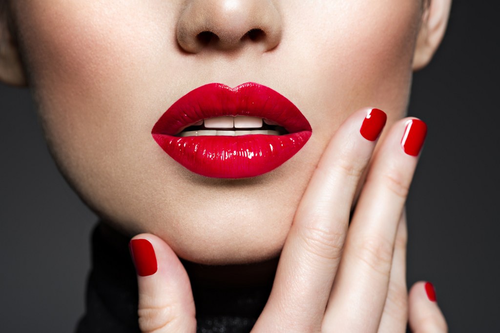 Closeup Sexy Female Lips with Lipstick.