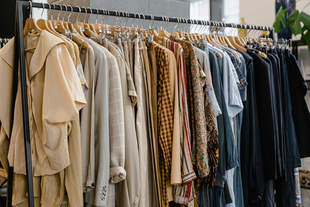 Clothes Hanging in a Rack.