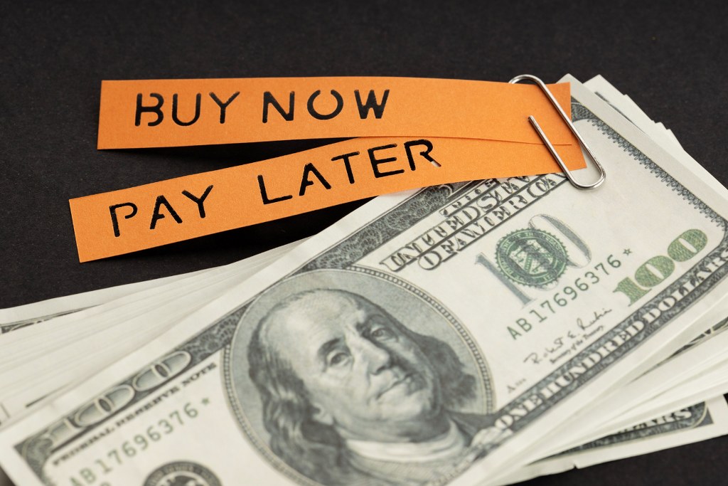 Dollar Bills and Label with Message on black background.