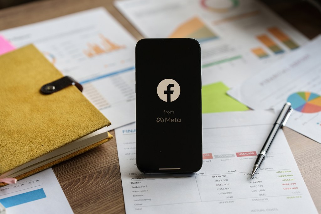 Facebook logo displayed on iphone.