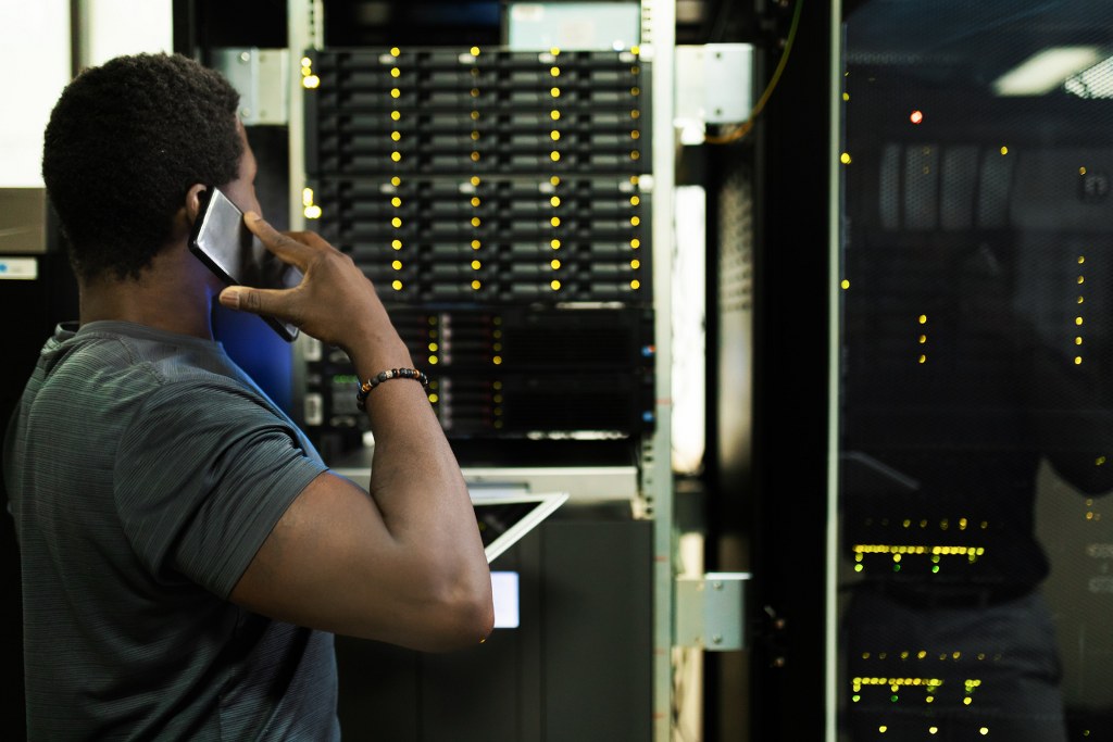 Man working at data center.