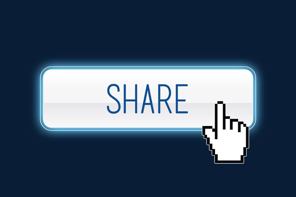 Share button with cursor.