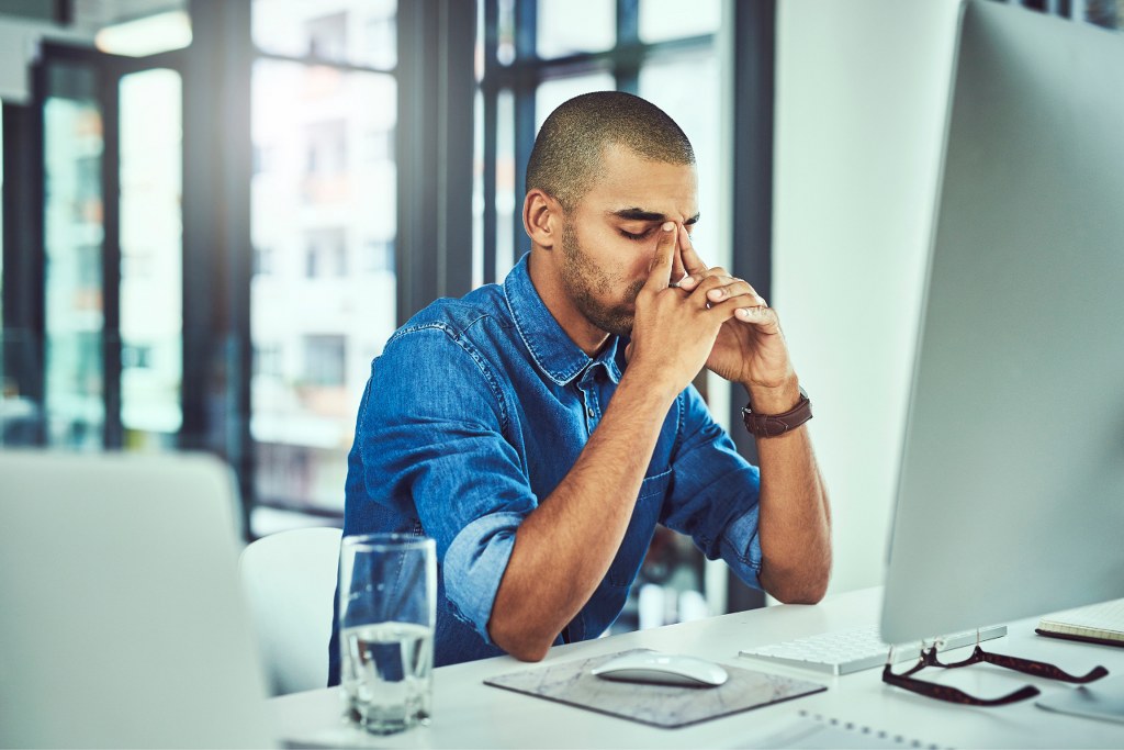 Stressed male business owner, very disappointed.
