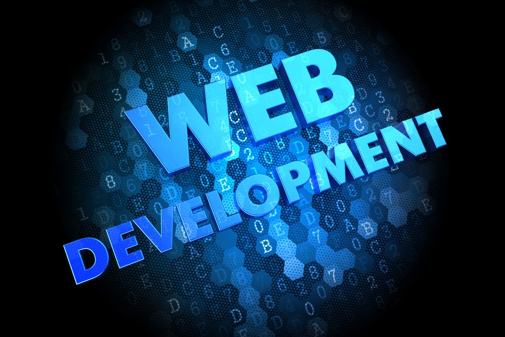 Web Development on Dark Digital Background.