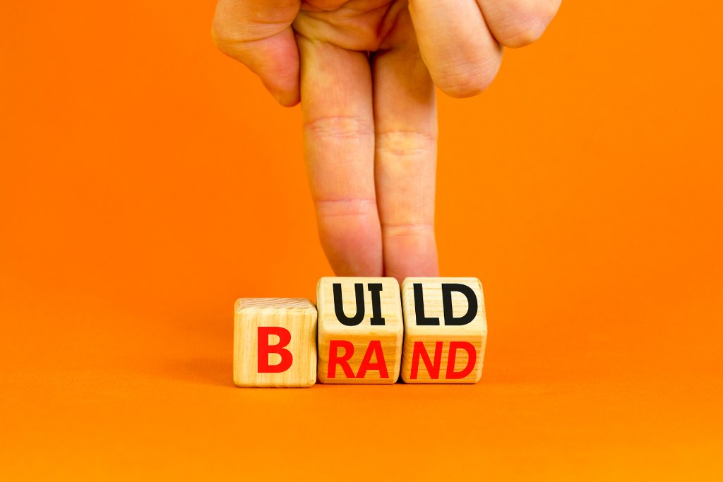 Words Build brand on wooden cubes.