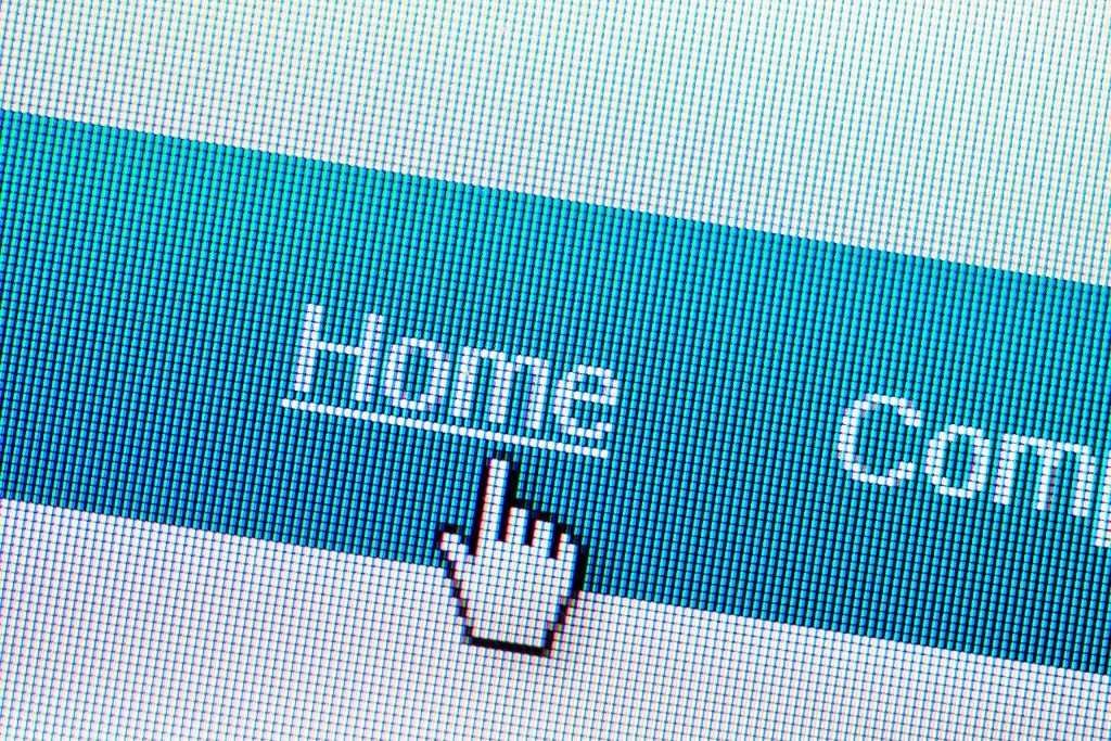 Computer mouse clicking on Homepage.