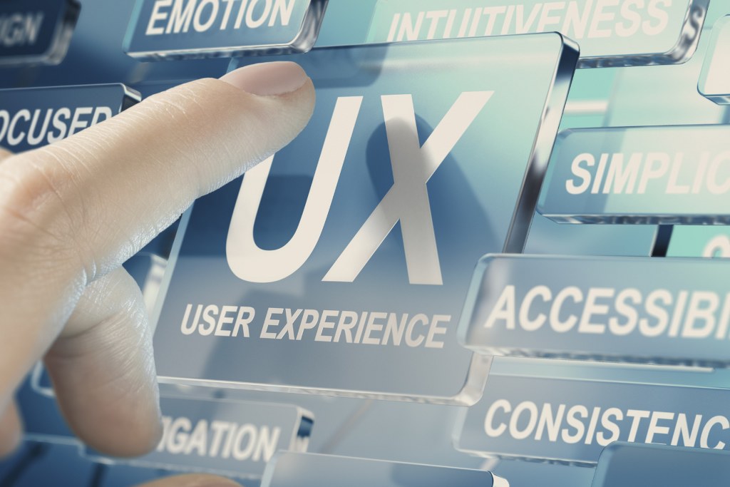 Finger pressing UX User experience button.