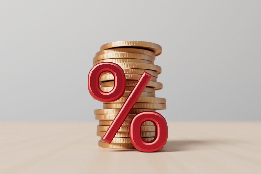  Red percentage symbol with a stack of coins.