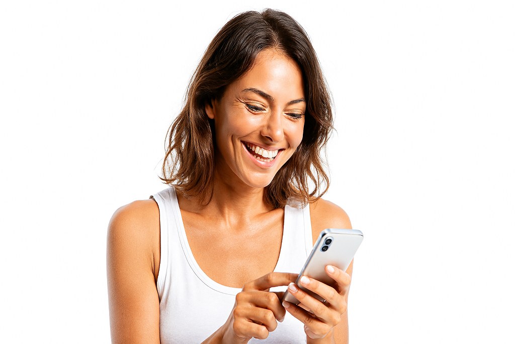 A woman looking at mobile phone content.