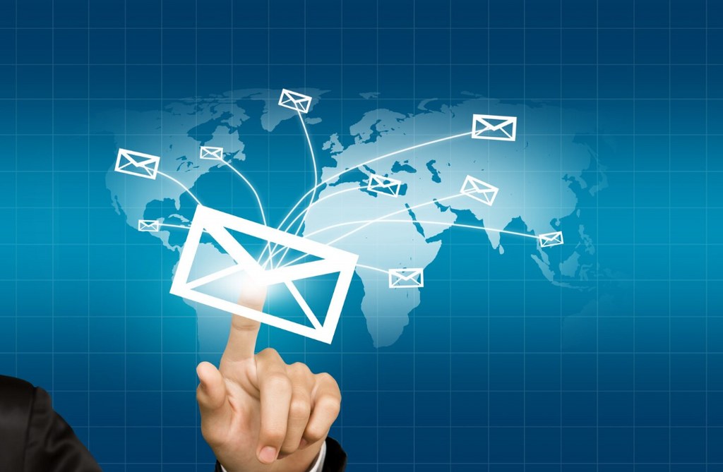 An illustration of someone sending an email.