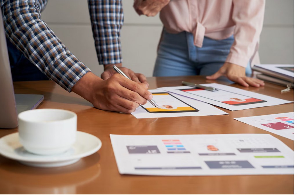 UX researchers tweaking a design.