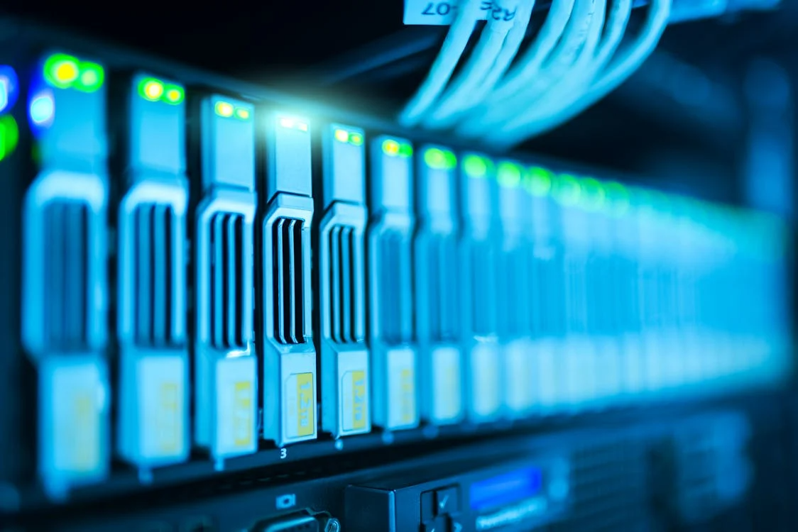 Close-up of high-performance computer hardware with illuminated components and cooling fans.