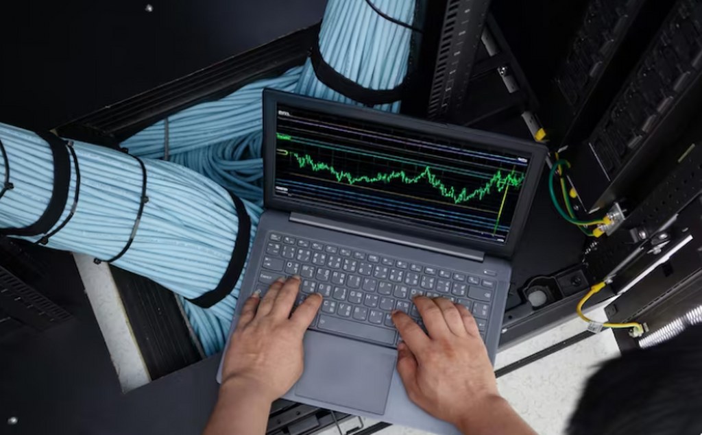 A network administrator viewing a latency graph.