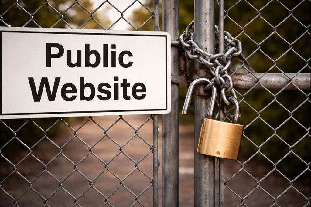 Public website sign on locked chain-link fence.