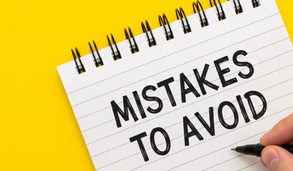 Writing mistakes to avoid on a notebook.