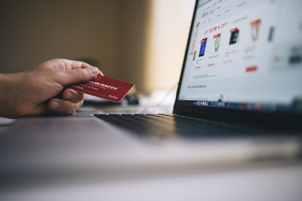 A buyer putting credit card details on an ecommerce website in order to make a purchase.