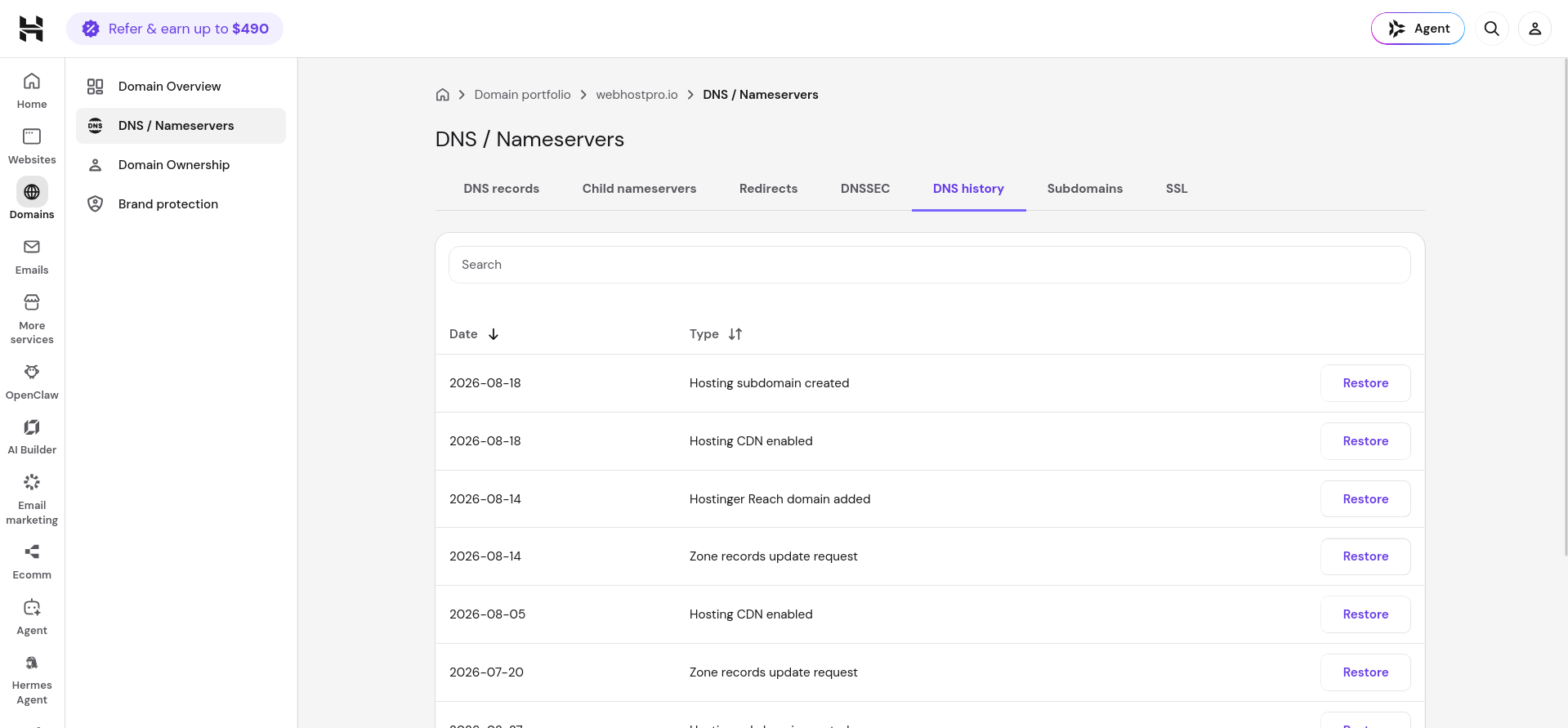 Hostinger DNS History tab showing previous DNS changes with Restore buttons