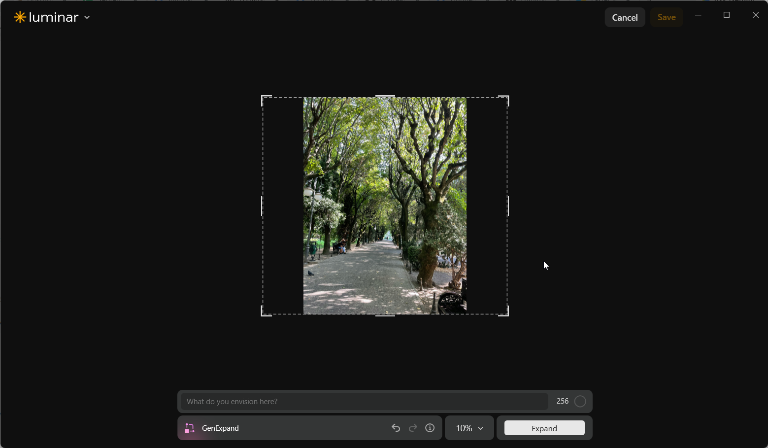 Luminar Neo GenExpand displaying a dotted enlarged frame extending to both sides of the park photo, with the text-prompt field empty.
